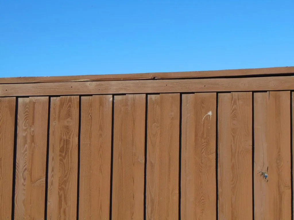 Clean fence panels after professional fence washing