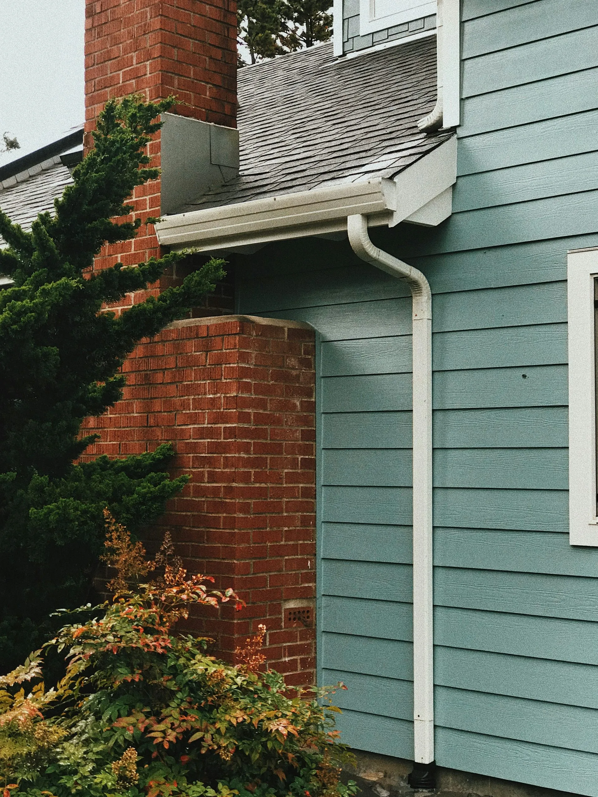 Residential home exterior with clean gutters